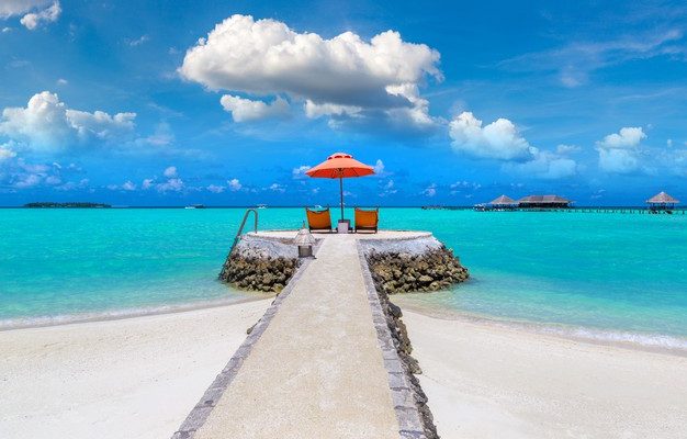 sunbed-umbrella-tropical-beach-maldives_255175-1737